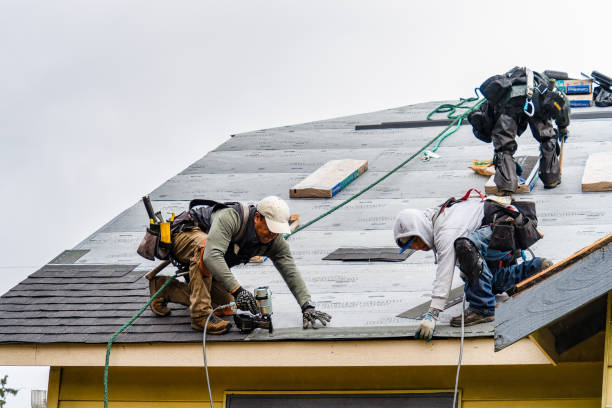 Professional Roofing technician working in West Greenwich, RI